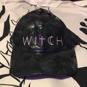 Very cute iridescent dad cap that says “WITCH”!